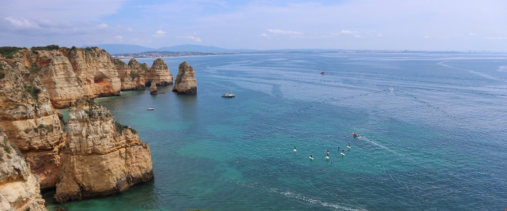 Panoramic view of the Mediterranean Sea and cliffs in Faro, the Algarve's most student-friendly city.